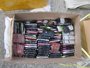 Used mobile phones seized by the Hong Kong Customs.