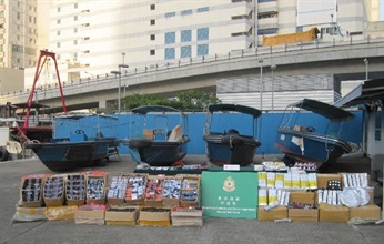 Four speedboats and a batch of smuggled goods seized by Hong Kong Customs during the operation.