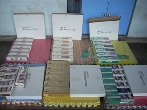 The Customs seizes a batch of illicit cigarettes worth about $0.77 million hidden inside an incoming truck.
