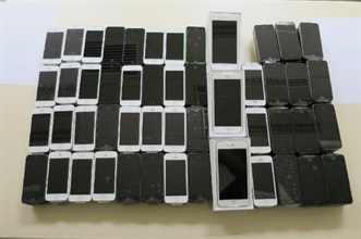 Some of the new smartphones seized by Customs.