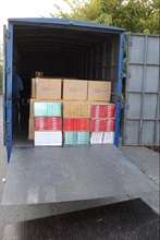 Photo shows some of the 200 cartons containing about 2.4 million illicit cigarettes seized by the Customs.