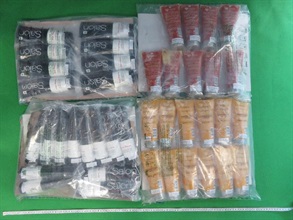 Hong Kong Customs seized about three kilograms of suspected ketamine and about 1.4kg of suspected cocaine at Hong Kong International Airport, with a total estimated market value of about $3.8 million on December 9 and yesterday (December 12) respectively. Photo shows the hair products packaging used to conceal the batch of suspected ketamine.