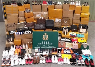 Hong Kong Customs conducted a targeted operation between November 18 and December 15 to combat cross-boundary counterfeit goods destined for the United States. About 13 000 items of suspected counterfeit goods with an estimated market value of about $1.5 million were seized. Photo shows some of the suspected counterfeit goods.