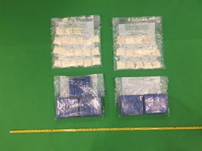 Hong Kong Customs yesterday (December 27) seized about 5 kilograms of suspected cocaine (pictured bottom) and 1 kilogram of suspected crack cocaine (pictured top) with an estimated market value of about $7.5 million in Sheung Shui.