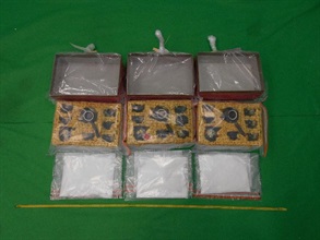 Hong Kong Customs seized about 2 kilograms of suspected ketamine with an estimated market value of about $1.3 million at Hong Kong International Airport on January 14. Photo shows the batch of suspected ketamine (bottom) and the tea ware sets used for concealing the suspected ketamine.