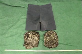 The suspected cocaine found concealed under the compression shorts.