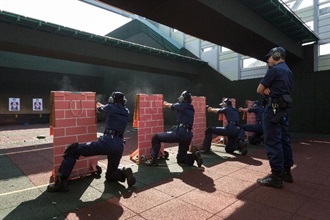 The Customs and Excise Department will start a Probationary Inspector recruitment exercise this Friday (January 26). The application period for the post closes on February 5. Candidates who pass the selection process will receive training at the Customs and Excise Training School. Photo shows trainees undergoing firearms training.