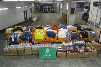 Hong Kong Customs stepped up enforcement to combat cross-boundary smuggling activities before and during the Lunar New Year holiday. Photo shows suspected infringing apparel and accessories seized.