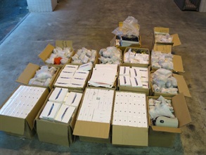 The suspected smuggled electronic gadgets placed amidst the declared goods.