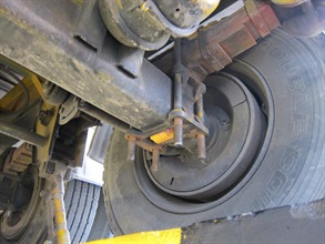 A false compartment in the axle of a trailer.