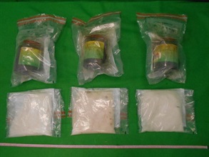 Hong Kong Customs yesterday (April 3) seized about 5 kilograms of suspected methamphetamine with an estimated market value of about $2.8 million at Hong Kong International Airport. Photo shows the suspected methamphetamine seized and the plastic bottles used as containers.