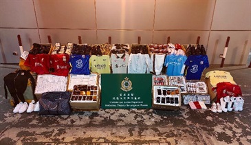 Hong Kong Customs conducted a targeted operation in July to combat cross-boundary counterfeiting activities involving goods destined for the United States. About 60 000 items of suspected counterfeit goods with an estimated market value of about $3.2 million were seized. Photo shows some of the suspected counterfeit goods seized.