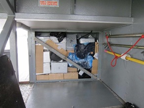 High-valued electronic products seized in passenger baggage area of the cross-boundary coach.