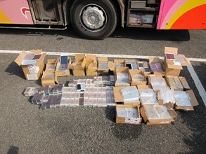 High-valued electronic products seized in cross-boundary coach.