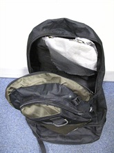 A pack of heroin concealed inside the backside of the rucksack