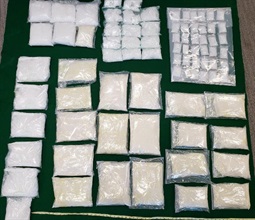 Hong Kong Customs smashed a suspected methamphetamine manufacturing and storage centre in Yuen Long on May 11. A total of about 32 kilograms of suspected methamphetamine was seized with an estimated market value of about $16.5 million. Photo shows the suspected methamphetamine seized.