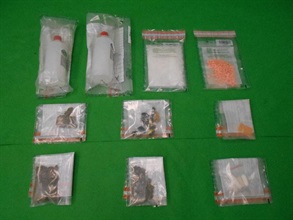 Hong Kong Customs seized a batch of suspected dangerous drugs weighing about 18 kilograms in total, as well as a batch of drug inhalation apparatus and packaging materials, with an estimated market value of about $1.9 million at Hong Kong International Airport and Central on May 12 and yesterday (May 14) respectively. Photo shows some of the suspected drugs seized.