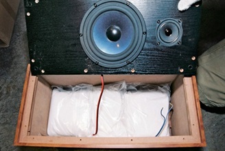 Several packs of ketamine were found inside each speaker.