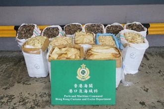Hong Kong Customs seized about 140 kilograms of suspected scheduled dried seahorses and 220kg of dried shark fins from a container with an estimated market value of about $420,000 at the Kwai Chung Customshouse Cargo Examination Compound on June 4.