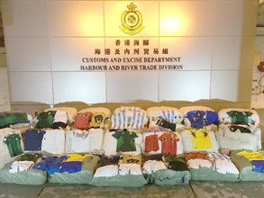 Anticipating that the 2018 FIFA World Cup matches would provide opportunities for criminals to develop infringement business, Hong Kong Customs is undertaking a special operation codenamed "Goalkeeper", focusing on infringing items that may be trafficked through passenger and cargo channels at the airport, seaport, land boundary and railway control points on the eve of the matches. The operation started on April 30, and until yesterday (June 13) about 259 000 suspected infringing items valued at about $15.3 million had been seized in 21 cases with five arrests also made. Photo shows some of the items seized.