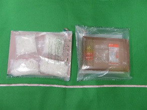 Hong Kong Customs yesterday (July 11) seized about 1.4 kilograms of suspected methamphetamine and a set of inhalation apparatus with an estimated market value of about $970,000 at Lok Ma Chau Control Point.