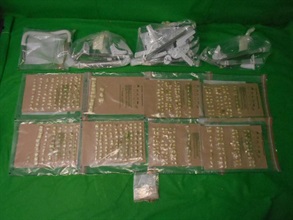 Hong Kong Customs seized about 950 grams of suspected methamphetamine with an estimated market value of about $520,000 at Hong Kong International Airport on July 25. Photo shows the suspected methamphetamine seized and the metal frames used to conceal the suspected methamphetamine.