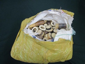 Hong Kong Customs and the Agriculture, Fisheries and Conservation Department mounted a joint anti-endangered species smuggling operation codenamed "Defender" at the airport, seaport, land boundary and railway control points between June 18 and August 25. Photo shows some of the suspected worked ivory seized.