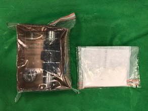Hong Kong Customs seized about 500 grams of suspected cocaine with an estimated market value of about $520,000 at Hong Kong International Airport on October 1. Photo shows the suspected cocaine seized and the metal gear in which it was concealed.