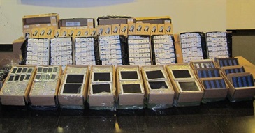 The mobile phones, tablet computers, flash drives and hard disks seized in the operation.