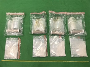 Hong Kong Customs seized about 1.5 kilograms of suspected methamphetamine and about 550 grams of suspected cocaine with an estimated market value of about $1.4 million at Hong Kong International Airport on October 16. Photo shows the suspected methamphetamine and suspected cocaine seized.