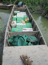 Sampan containing suspected smuggled goods.