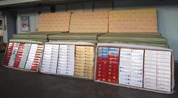 Hong Kong Customs mounted an anti-illicit cigarette operation from November 20 to 21 and seized a total of about 1.9 million suspected illicit cigarettes with an estimated market value of about $5.2 million and a duty potential of about $3.7 million at Man Kam To Control Point and Chek Lap Kok. Photo shows some of the suspected illicit cigarettes seized.