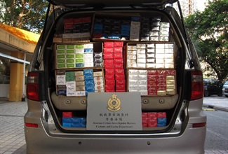 Hong Kong Customs has mounted an enforcement operation codenamed "Thunder IV" in the past three weeks to combat illicit cigarette telephone-ordering activities in public rental housing. A total of about 2 million suspected illicit cigarettes with an estimated market value of about $5.6 million and a duty potential of about $3.9 million were seized across the territory. Fifty-five persons were arrested. Photo shows one of the vehicles suspected of being used for illicit cigarette distribution.