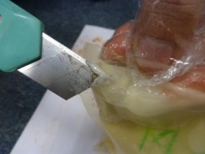 Suspected liquid cocaine found from the packets of tomato sauce.