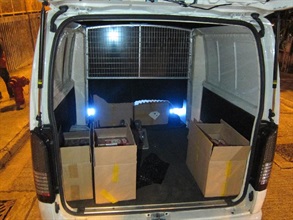 Some of the suspected illicit cigarettes seized by Customs in one of the vehicles.
