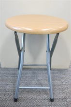 The folding stool with potential hazards.