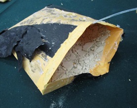 The suspected heroin is concealed inside a placemat.