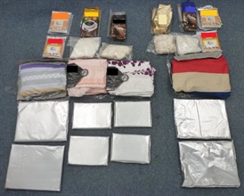 Suspected cocaine concealed in bed linen and packets of coffee powder and flour.