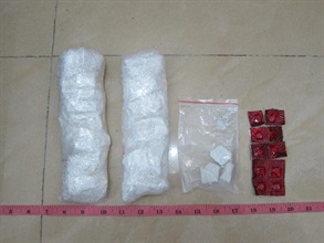 The 10 suspected Nimetazepam tablets and some of the suspected heroin seized.