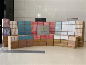 Hong Kong Customs yesterday (June 8) raided a suspected illicit cigarette storage in Tai Po and seized about 3.3 million suspected illicit cigarettes and about 120 000 suspected alternative smoking products with an estimated market value of about $9.2 million and about $300,000 respectively. The duty potential of the batch of suspected illicit cigarettes was about $6.5 million. Photo shows some of the suspected illicit cigarettes seized.