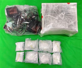 Hong Kong Customs yesterday (June 15) detected two drug trafficking cases in Chai Wan and Sham Shui Po and seized about 5.2 kilograms of suspected cocaine, about 760 grams of suspected ketamine and about 65g of suspected crack cocaine with a total estimated market value of about $6.5 million. Photo shows the suspected cocaine seized by Customs officers in Chai Wan and the transformer suspected to be used to conceal the drugs.