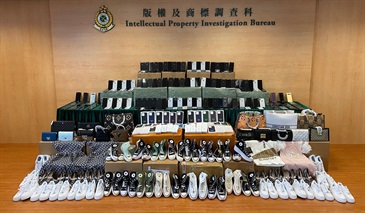Hong Kong Customs seized about 4 400 items of suspected counterfeit goods with a total estimated market value of about $3 million at Shenzhen Bay Control Point, Tsing Yi and Kwai Chung from June 27 to 29. Photo shows some of the suspected counterfeit goods seized by Customs officers in Tsing Yi and Kwai Chung.