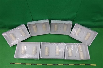 Hong Kong Customs detected three drug trafficking cases through the air cargo channel between November last year and June this year. A total of about 11 kilograms of suspected cocaine and about 685 grams of suspected heroin with an estimated market value of about $16.2 million were seized at Tsing Yi and Hong Kong International Airport. A man suspected to be connected with the cases was arrested yesterday (June 3). Photo shows 15 candles with the suspected cocaine mixed in.