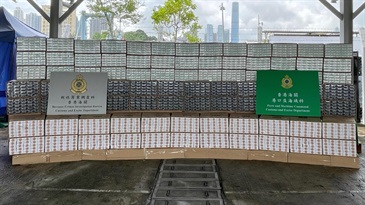 Hong Kong Customs on August 5 detected a suspected illicit cigarette smuggling case involving a barge and a tugboat in the waters off Stonecutters Island and Tsing Yi. About 42 million suspected illicit cigarettes with an estimated market value of about $115 million and a duty potential of about $80 million were seized. Photo shows some of the suspected illicit cigarettes seized.