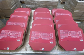 Hong Kong Customs on August 16 detected a suspected smuggling case involving a river trade vessel in the western waters of Hong Kong. A large batch of suspected smuggled goods with a total estimated market value of about $43 million was seized, including assorted electronic products, cosmetic products and high-value food. Photo shows some suspected smuggled mooncakes seized.