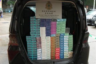 Hong Kong Customs has mounted a special enforcement operation in the past three weeks to combat illicit cigarette telephone-ordering activities in public rental housing estates in Kowloon East District. A total of about 150 000 suspected illicit cigarettes and about seven grams of suspected cannabis buds were seized. The estimated market value of the suspected illicit cigarettes was about $420,000 with a duty potential of about $290,000. Photo shows the suspected illicit cigarettes seized from a vehicle suspected to be used for illicit cigarette distribution.