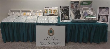 Hong Kong Customs seized about 23.5 kilograms of suspected heroin with an estimated market value of about $29 million at Kwai Chung Customhouse Cargo Examination Compound on May 27. Photo shows the suspected dangerous drugs seized and part of the water filters and coffee machines used to conceal the dangerous drugs.