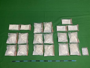 Hong Kong Customs on October 12 seized about 14 kilograms of suspected methamphetamine and about 5kg of suspected cocaine with a total estimated market value of about $14 million at Hong Kong International Airport. Photo shows the suspected methamphetamine and suspected cocaine seized.