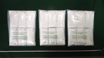 香港海關昨日（十月二十四日）在荃灣檢獲約九公斤懷疑氯胺酮，估計市值約五百二十萬元。圖示檢獲的懷疑氯胺酮。