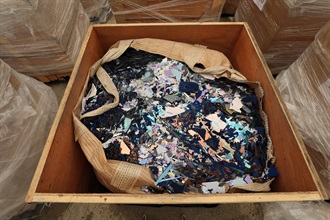 Hong Kong Customs on October 26 detected a suspected case of using an ocean-going vessel to smuggle goods to the Mainland at the Kwai Chung Container Terminals. A large batch of suspected smuggled goods, including expensive food ingredients, table wines, electronic goods, solid waste and scheduled endangered species, with a total estimated market value of about $300 million was seized. This is the largest sea smuggling case detected by Customs this year in terms of the seizure value. Photo shows some of the suspected smuggled solid waste seized.